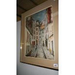 A framed and glazed continental street scene