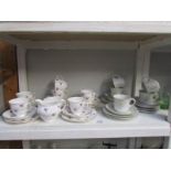 A shelf of tea ware