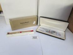 A Conway Stewart pen set and a Scripto pen