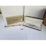 A Conway Stewart pen set and a Scripto pen