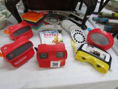 4 viewmaster viewers and many reels including Rupert,