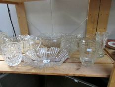 A shelf of glass ware