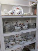 Approximately 85 pieces of Royal Worcester Evesham pattern tea and dinner ware (3 shelves)