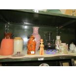 A shelf of miscellaneous including oriental