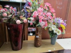 3 vases of artificial flowers