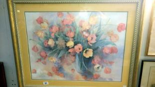 A framed and glazed limited edition print of anemones signed Stells '89,