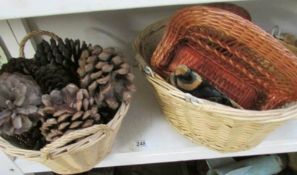 2 baskets and contents including fir cones