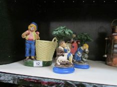 2 figural planters and 2 figures