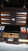A case of games including backgammon, cards,