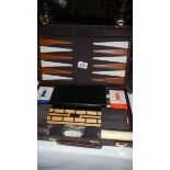 A case of games including backgammon, cards,