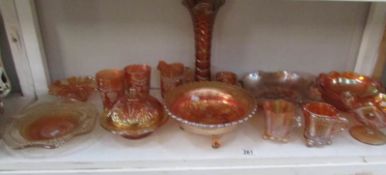 A shelf of carnival glass