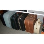 5 suitcases and a vanity case