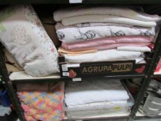 2 shelves of bedding etc