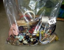 A bag of costume jewellery