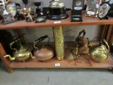 A shelf of brass and copper