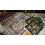 A quantity of embroidered cushion covers, prayer mats etc.