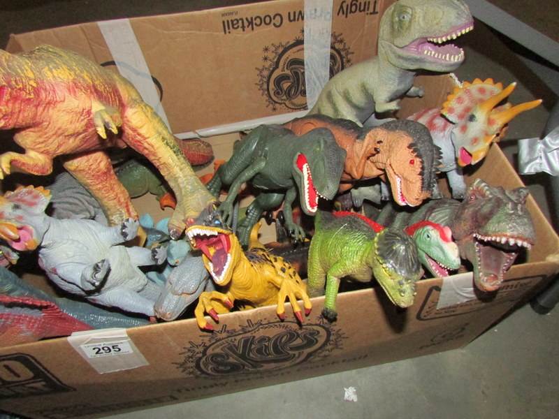 A large quantity of dinosaur toys