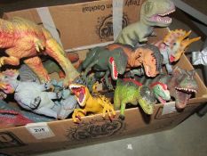 A large quantity of dinosaur toys