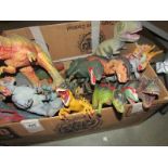 A large quantity of dinosaur toys