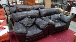 A black leather 3 piece suite with stool