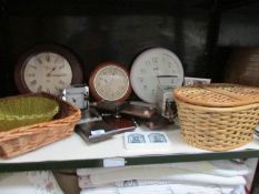 A shelf of miscellaneous including clocks,