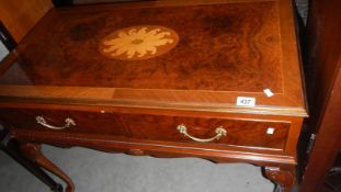 A stereo/radio cassette deck in an inlaid cabinet