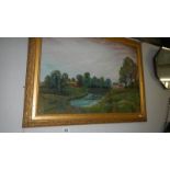 An oil on board rural scene signed Ted Moore