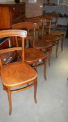 A set of 4 chairs with decorative seats