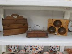 An oak letter rack,