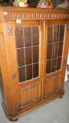 A lead glazed bookcase