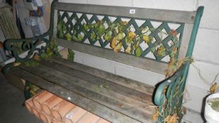 A metal and wood garden bench