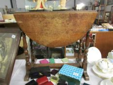 A small oak drop leaf table