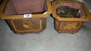 A pair of glazed garden pots