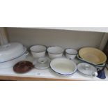 A shelf of enamel ware