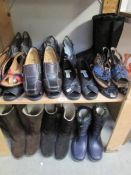 A quantity of boots and shoes