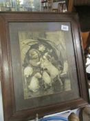 An oak framed and glazed print of children playing with a dog and puppies