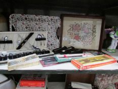 A shelf of cutlery,