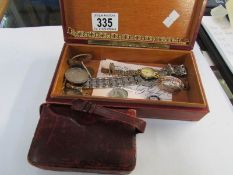 A box of miscellaneous jewellery and a hymnal