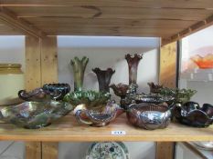 A shelf of carnival glass