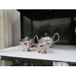 A silver plate teapot and one other teapot etc.