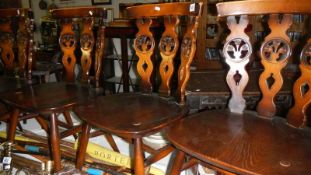 A set of 4 Ercol dining chairs