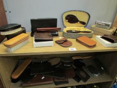 2 shelves of vanity items, wallets,