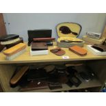 2 shelves of vanity items, wallets,