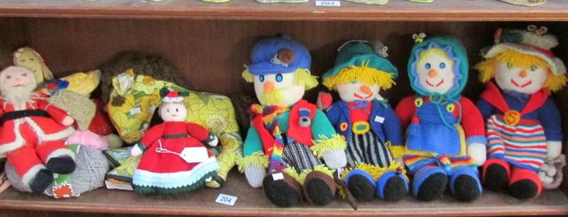 A shelf of hand knitted toys