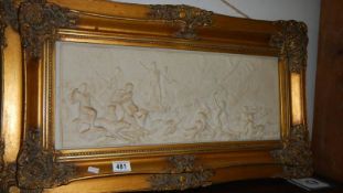 A gilt framed classical scene plaque