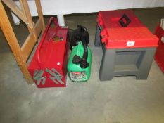 2 tool boxes and 2 petrol cans