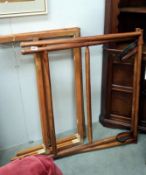 A darkwood stained suitcase stand and 2 pine folding trestles