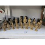 A chess set signed 'Paul BBC '89' depicting Narnia characters from The Lion,
