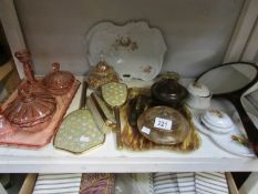 A shelf of assorted trinket ware