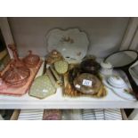 A shelf of assorted trinket ware